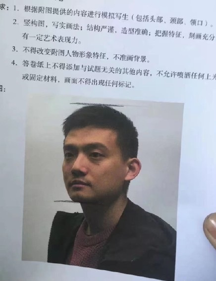 素描考題：男青年頭像。.jpg